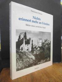 Claasen, Nichts erinnert mehr an Frieden – Bilder einer zerstörten Stadt,